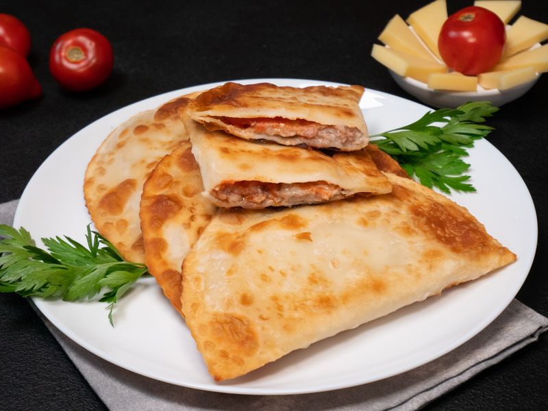 Pork, cheese and tomato сhebureki