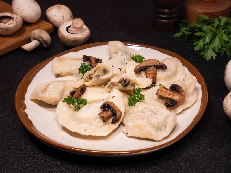 Potato and white mushrooms pierogy